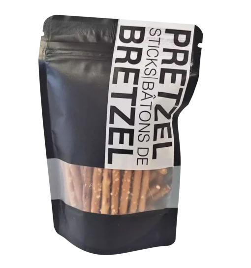 Black stand-up pouch of Pretzel Sticks – 60 g with clear window and vertical label, ideal for gifting or snack kits