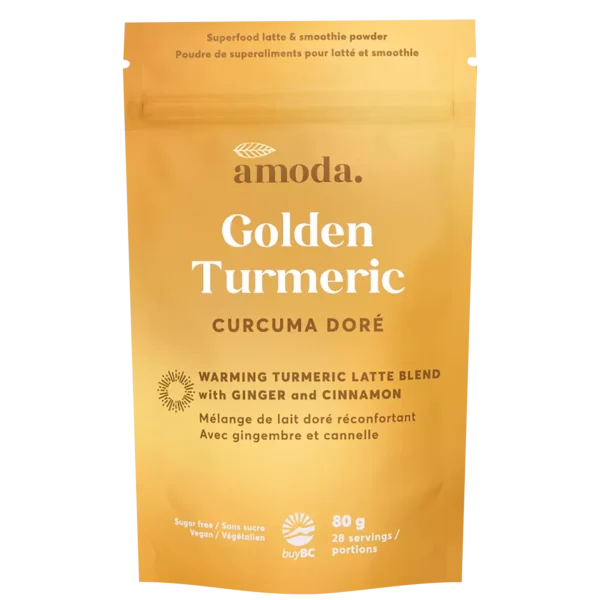Amoda Curcuma Doré golden turmeric blend prepared as a latte with organic spices in a ceramic cup